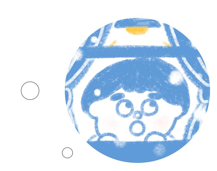 男の子が窓の外の雪を見ている